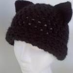 Here Kitty Kitty, Black Cat..