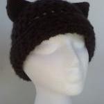 Here Kitty Kitty, Black Cat..
